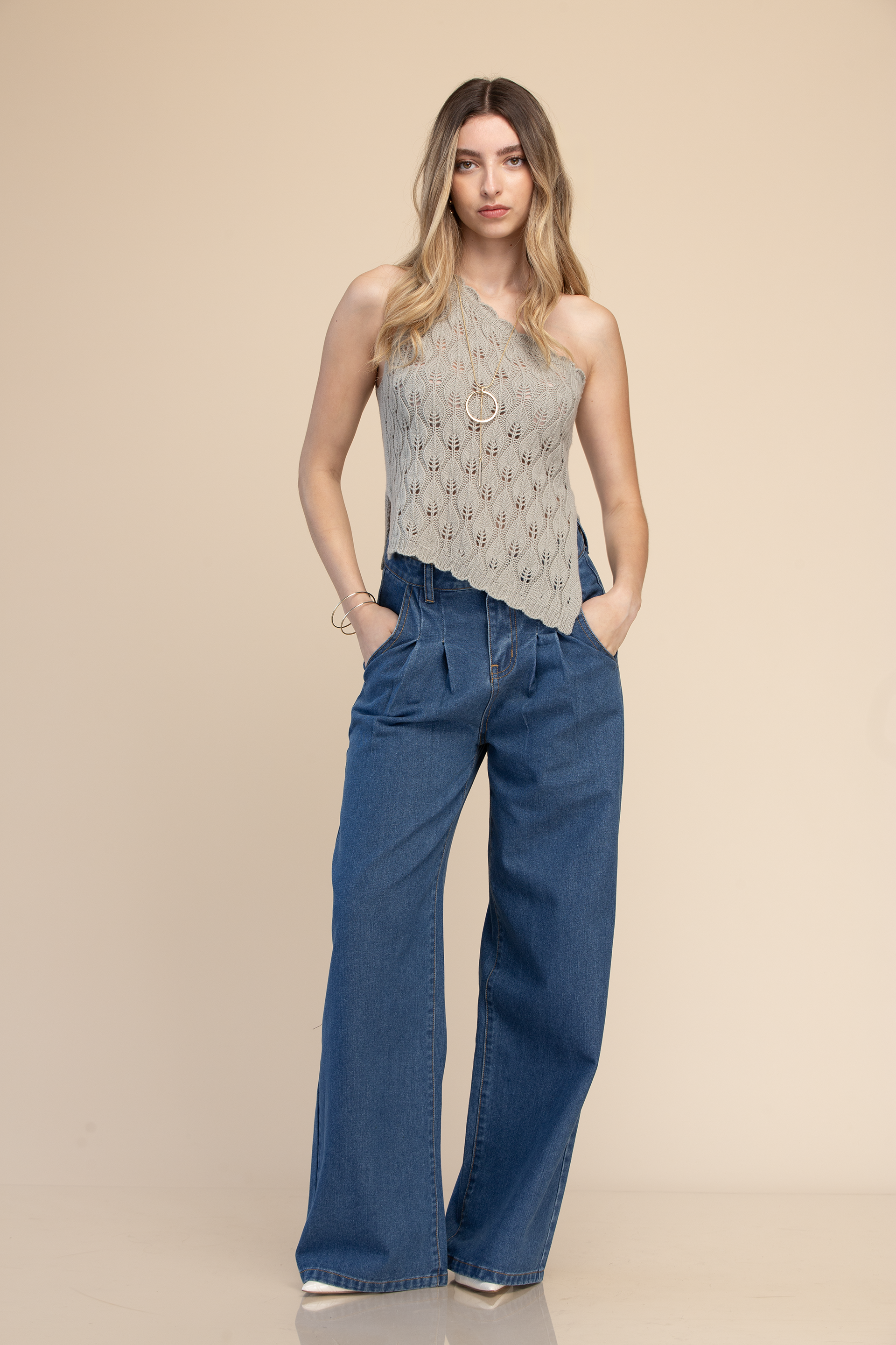 BLUSA TEJIDA ASIMÉTRICA